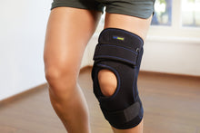 Load image into Gallery viewer, Actimove Sports Edition Knee Brace Wrap Around Polycentric Hinges Condyle Pads