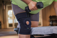 Load image into Gallery viewer, Actimove Sports Edition Knee Support Open Patella Adjustable, Black, Universal Plus