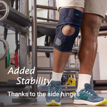 Load image into Gallery viewer, Actimove Sports Edition Knee Brace Wrap Around Polycentric Hinges Condyle Pads