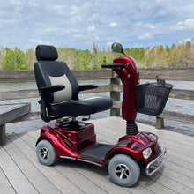 Load image into Gallery viewer, Merits Pioneer 4 Heavy-Duty Mobility Scooter, 4-Wheel, Captain Seat, Red, 400 lb Capacity
