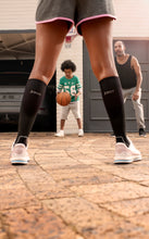 Load image into Gallery viewer, JOBST Sport Compression Socks 20-30 mmHg Knee High, Closed Toe, Cool Black/Black, X-Large
